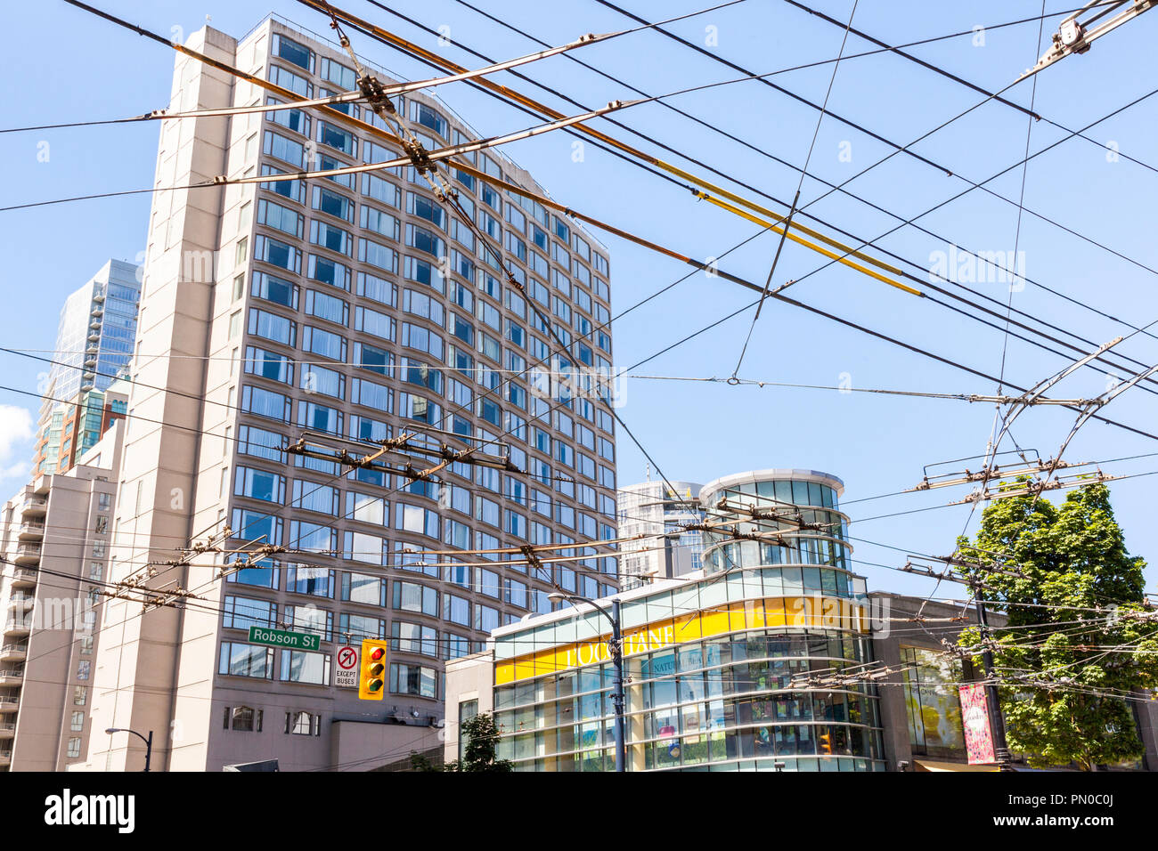 Overhead trolley bus wires crossing at the junction of Robson Street