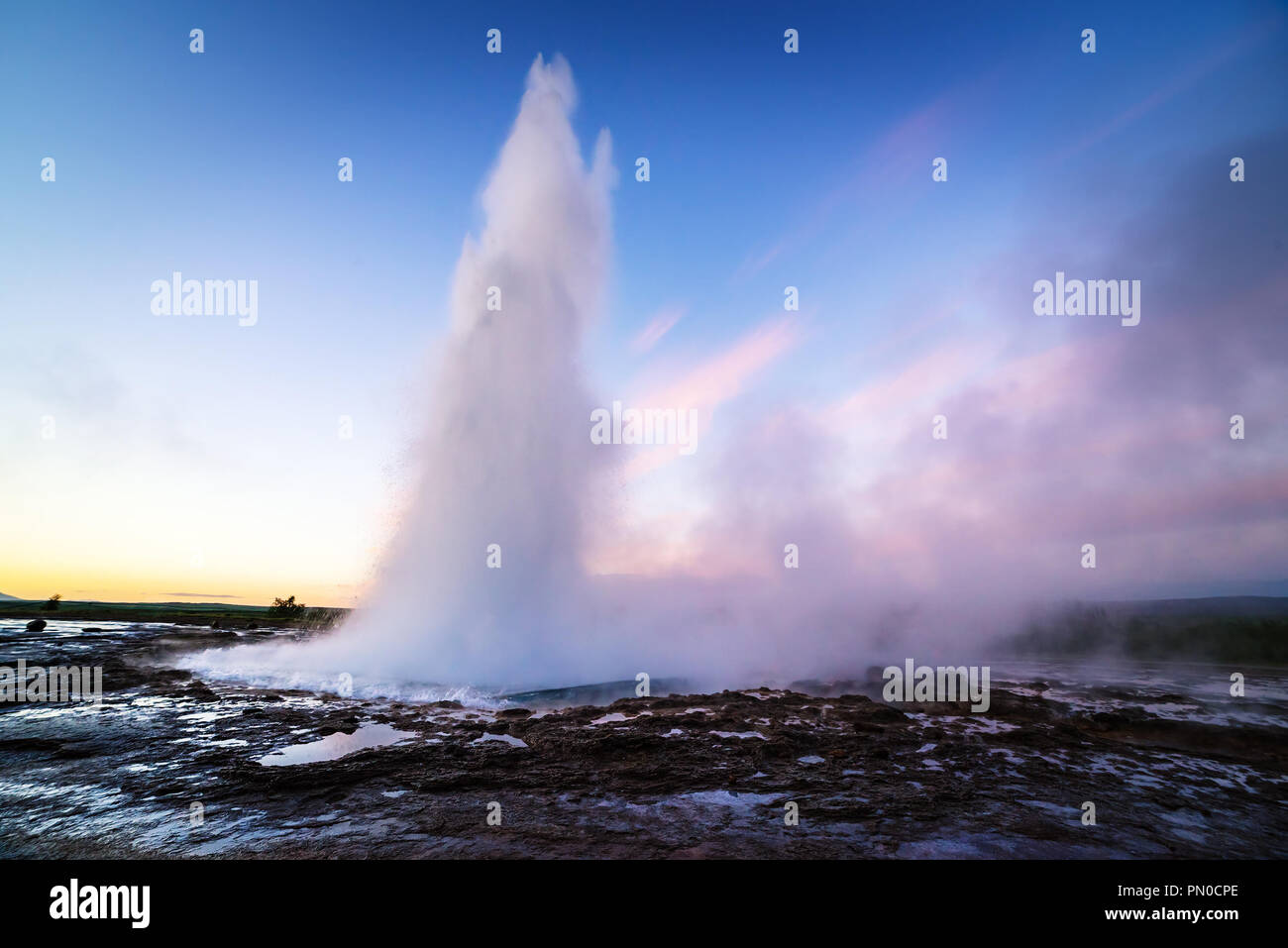 Strokkur geyser eruption. Golden circle Iceland. Famous natural and tourist attraction in valley Haukadalur Stock Photo