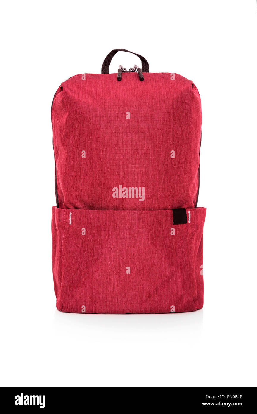 Red sporty backpack on a white background. Stock Photo