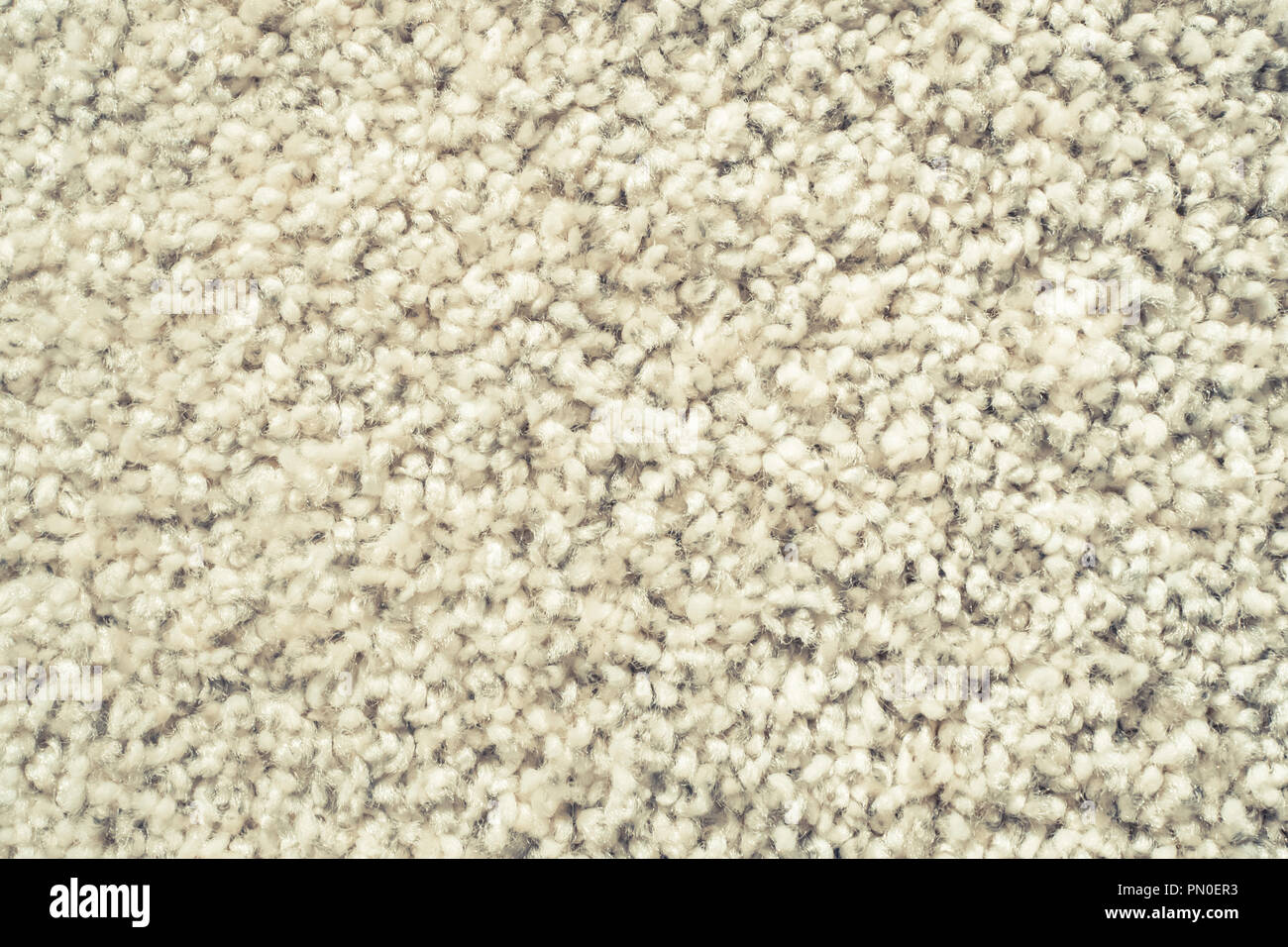 close up detail of absorbent fabric or shaggy white carpet, hairy carpet detail. absorbent fabric background. Stock Photo