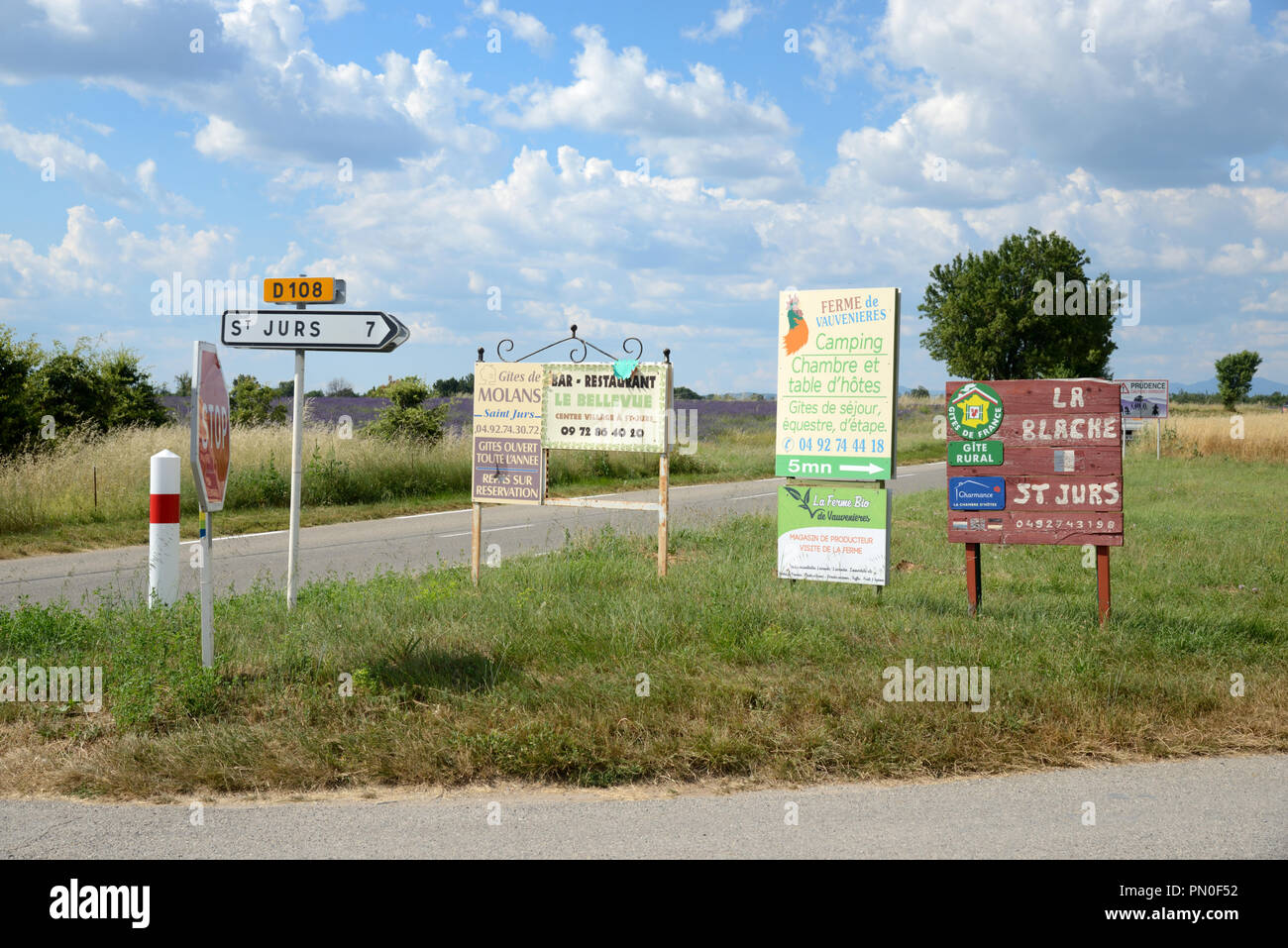 Multitude of Roadside Advertising Panels & Roadside Signs on the Valensole Plateau Provence France Stock Photo