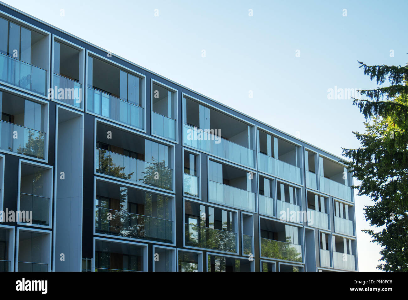 Facade of new modern apartment building Stock Photo - Alamy