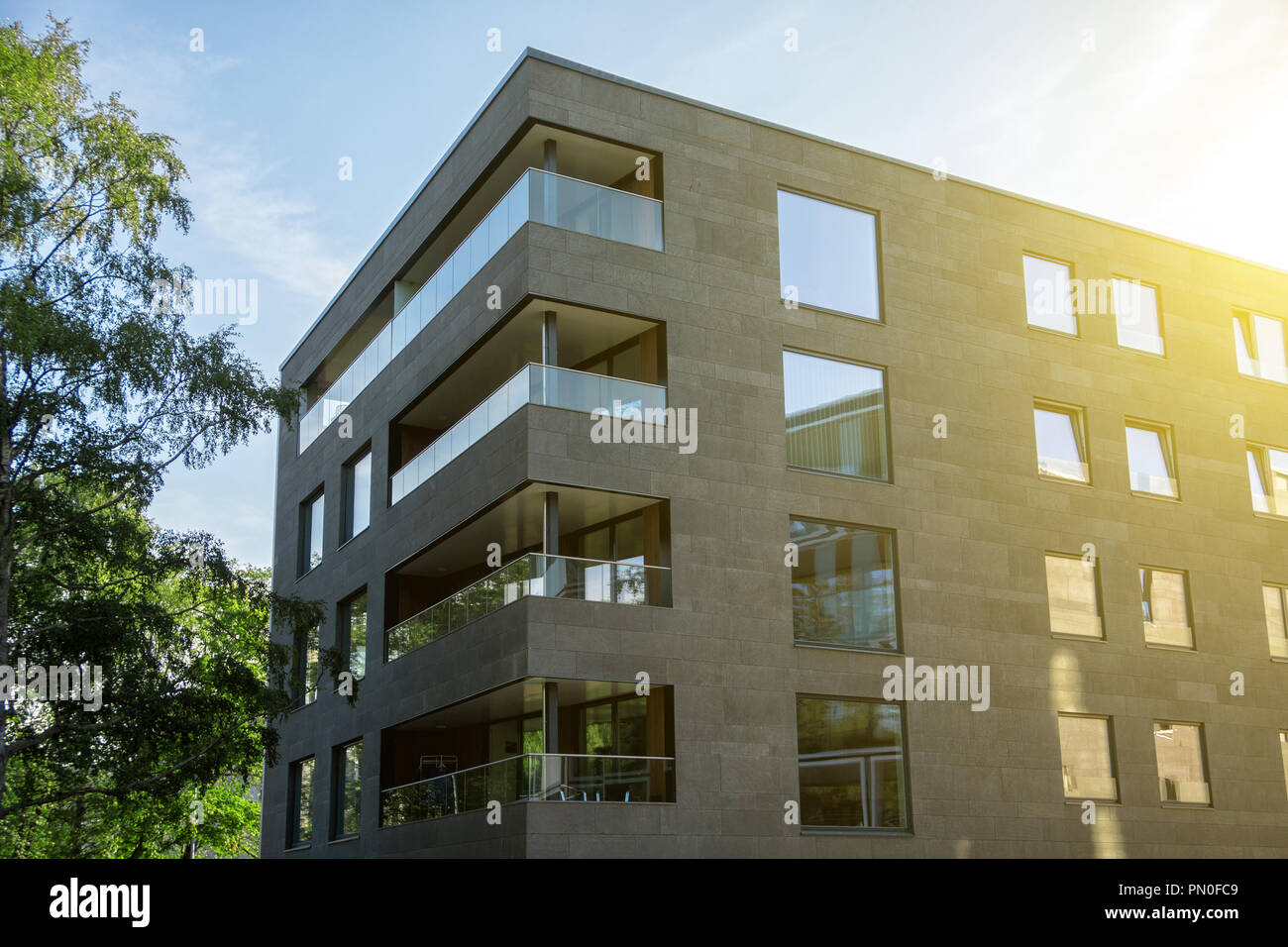 Facade of new modern apartment building Stock Photo - Alamy