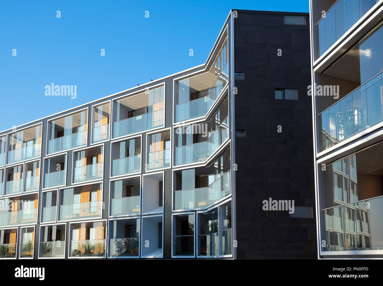 Facade of new modern apartment building Stock Photo - Alamy