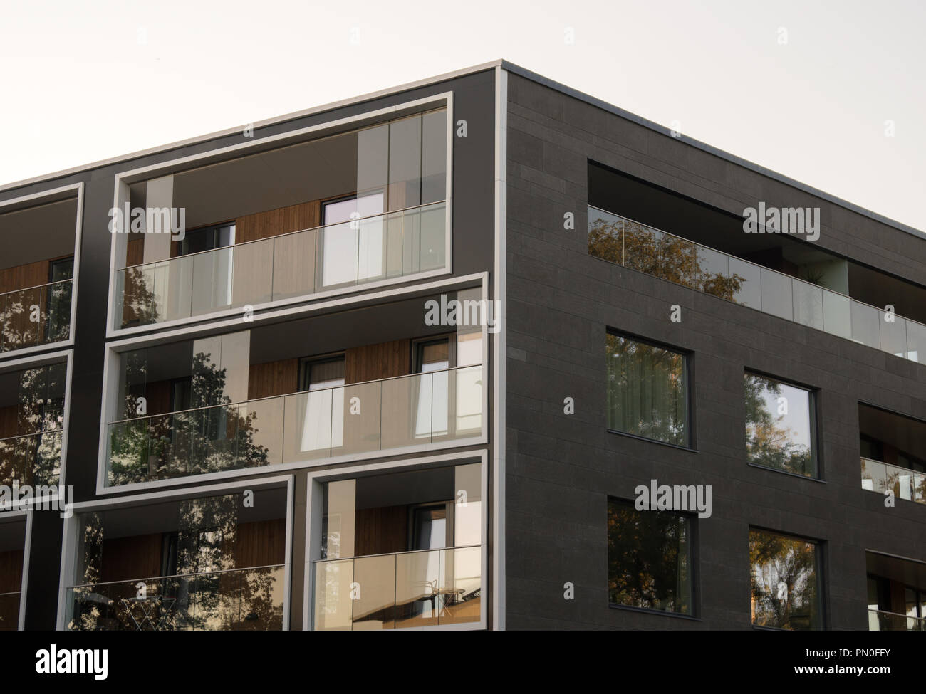 Facade of new modern apartment building Stock Photo - Alamy