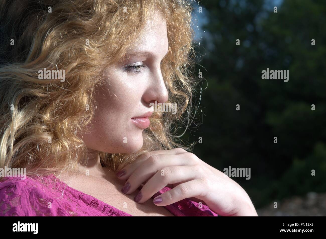 a portrait of  young blonde pretty woman Stock Photo