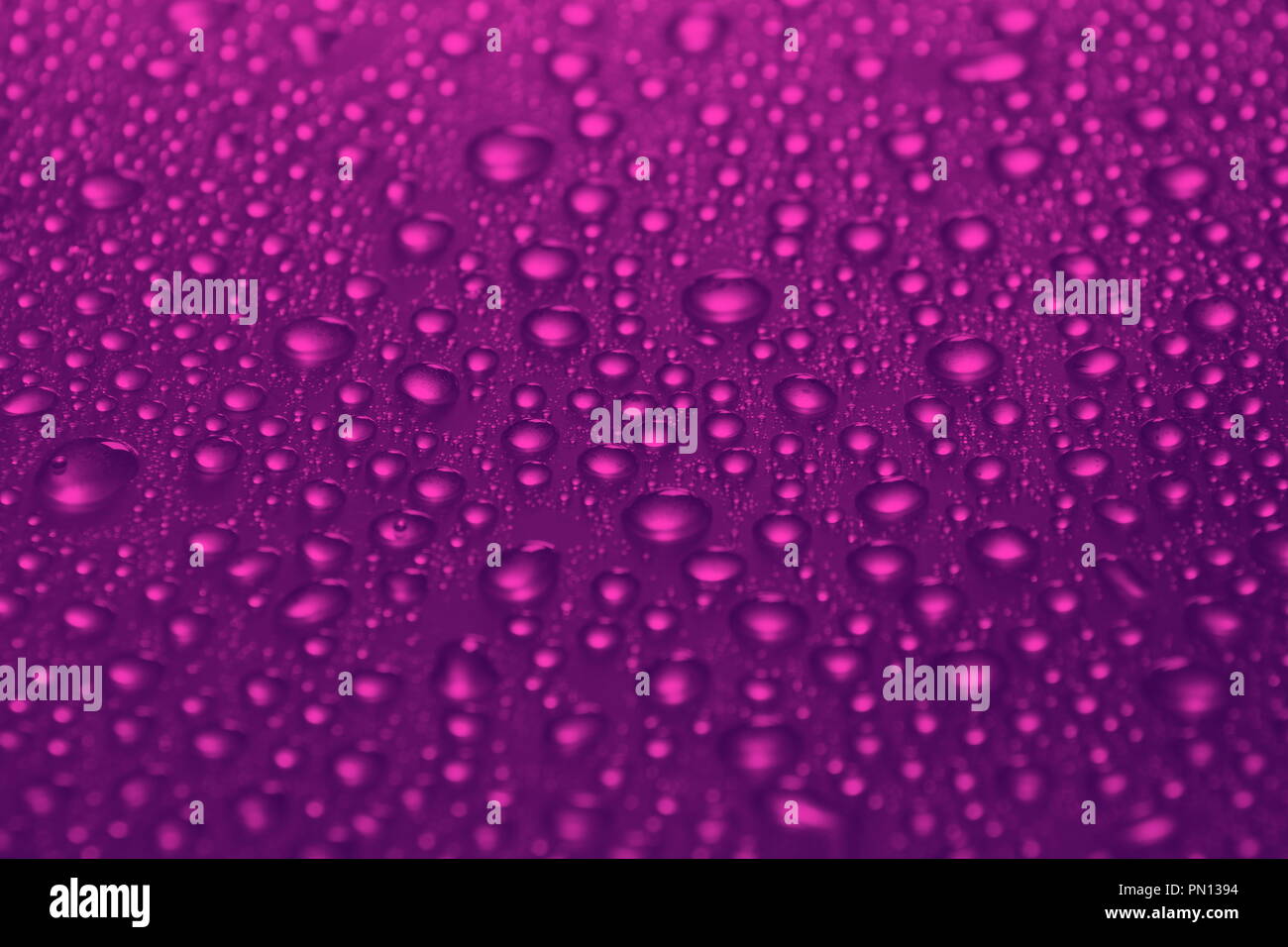 water drops on cherry color background texture closeup Stock Photo Alamy