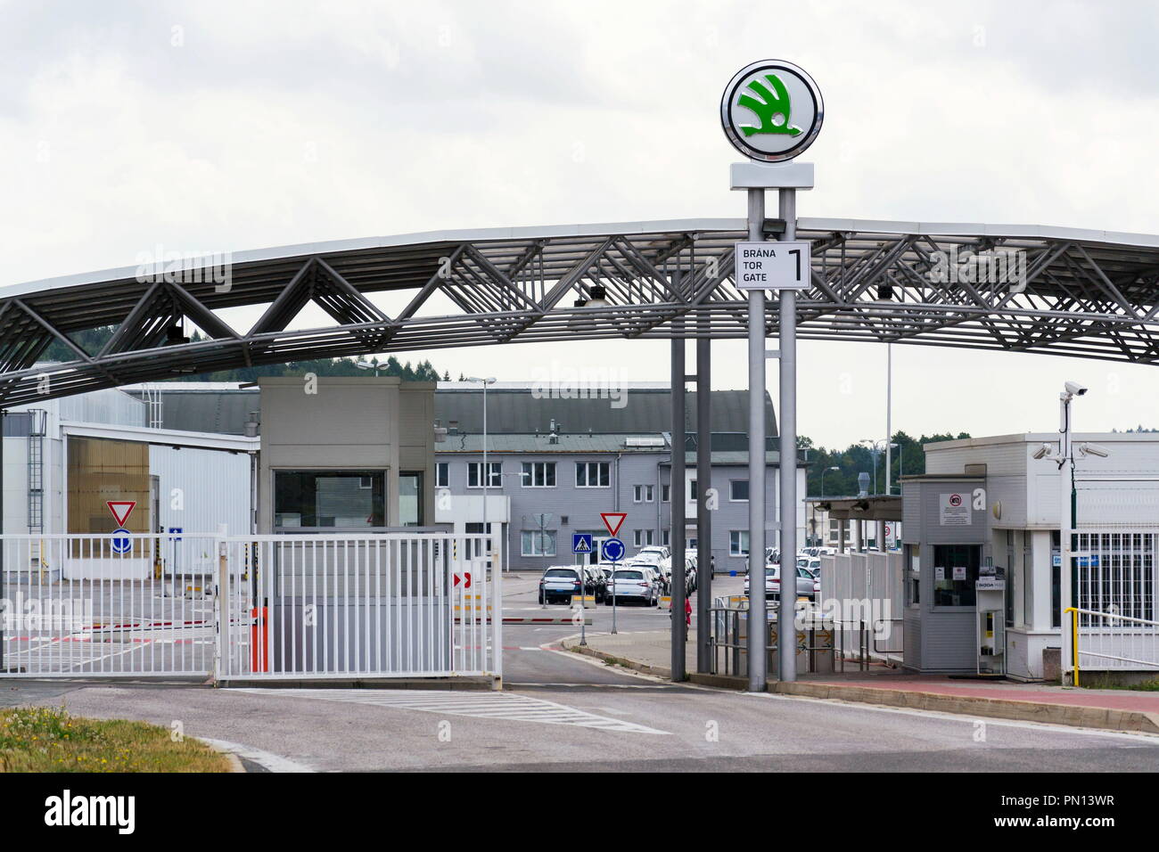 VRCHLABI, CZECH REPUBLIC - AUGUST 25 2018: Skoda Auto automobile manufacturer from Volkswagen Group company logo on plant gateway on August 25, 2018 Stock Photo