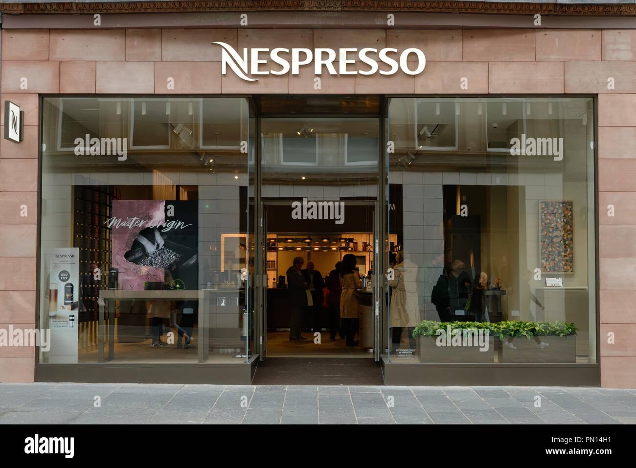 Nespresso premium coffee shop in Buchanan Street, Glasgow, Scotland, UK is  an operating unit of the Nestlé Group Stock Photo - Alamy