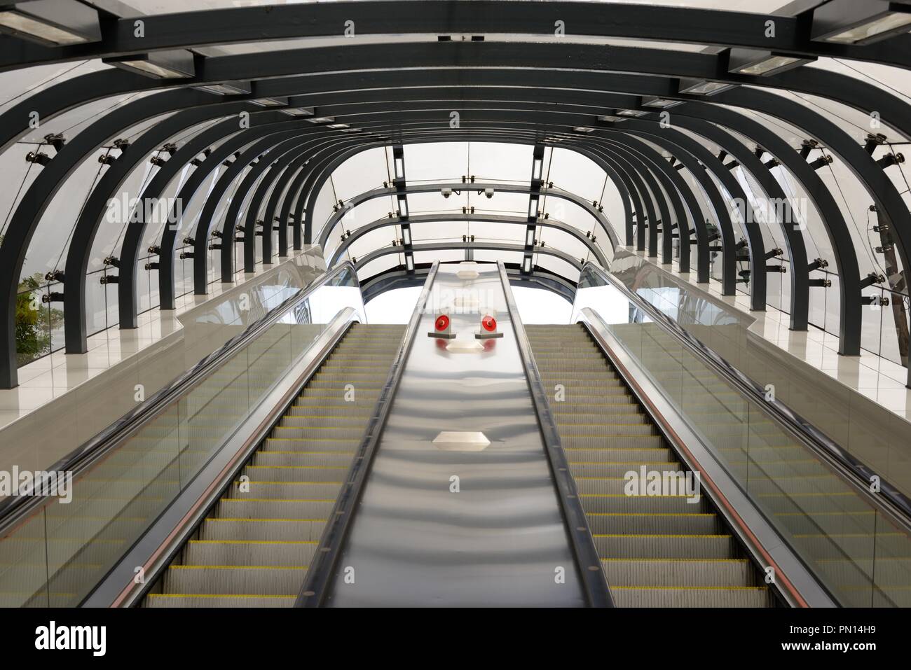 Twin escalators looking skyward at Kelvingrove underground subway station in Glasgow, Scotland, UK Stock Photo
