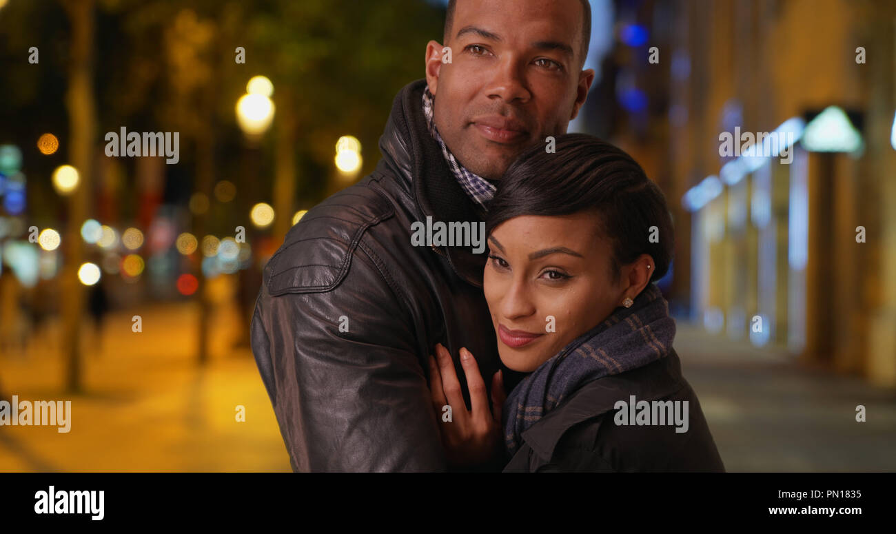 Couple holding each other tightly hi-res stock photography and images ...