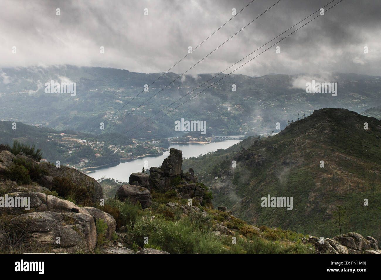 Mountain landscape during a stormy misty day. Stock Photo