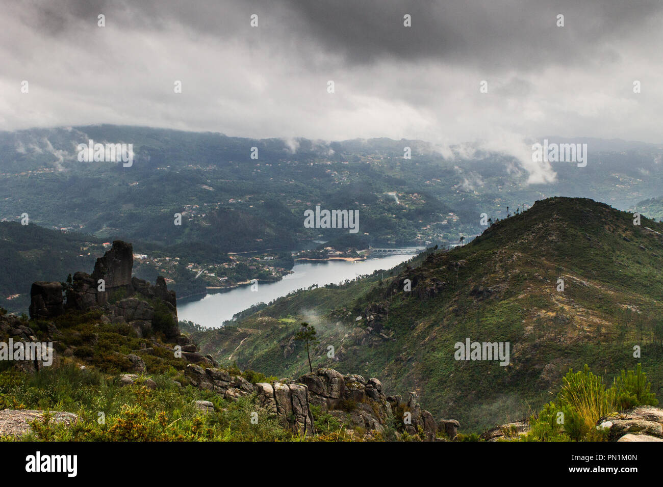 Mountain landscape during a stormy misty day. Stock Photo