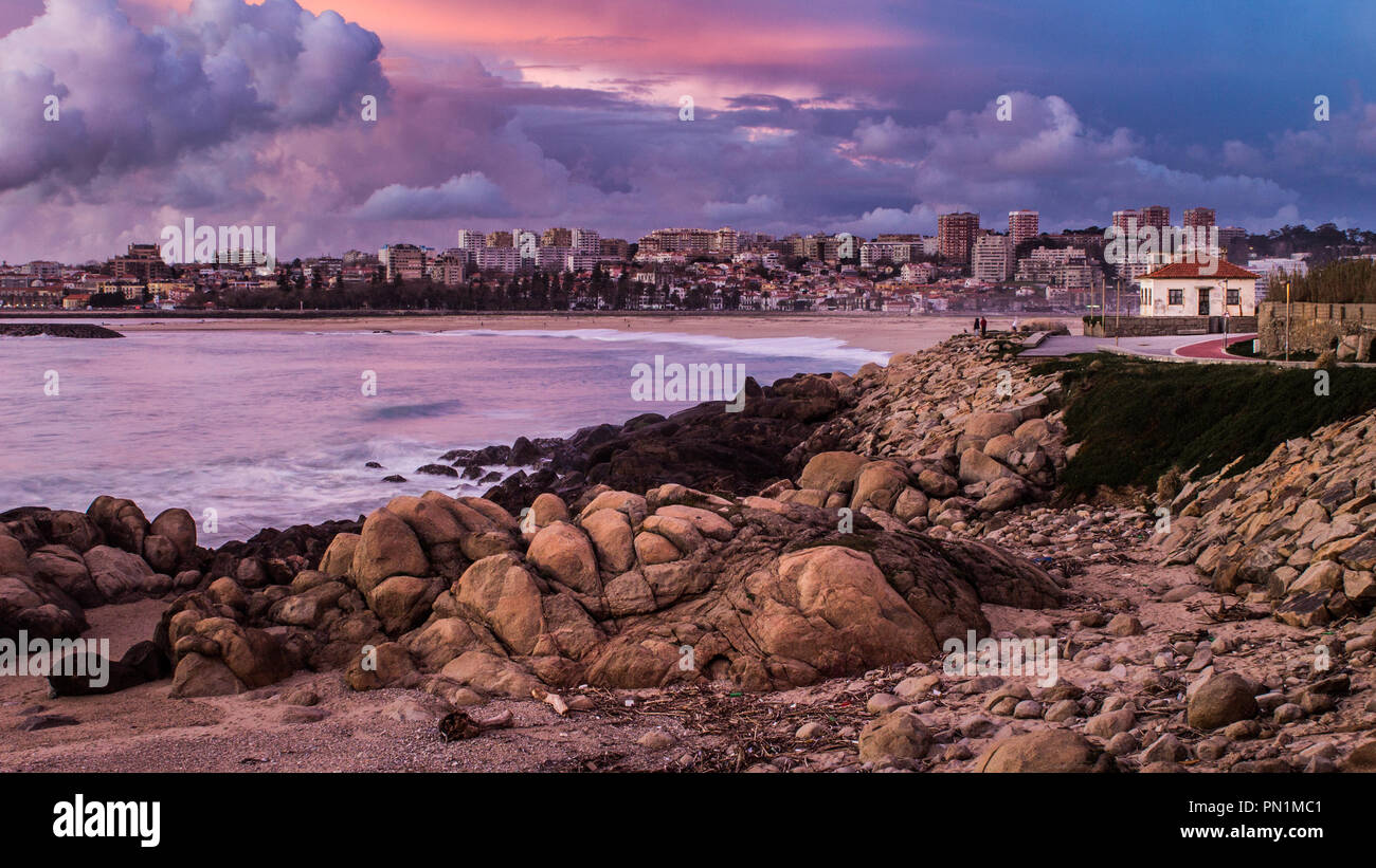 Porto cityscape as seen from a rocky beach. Stock Photo