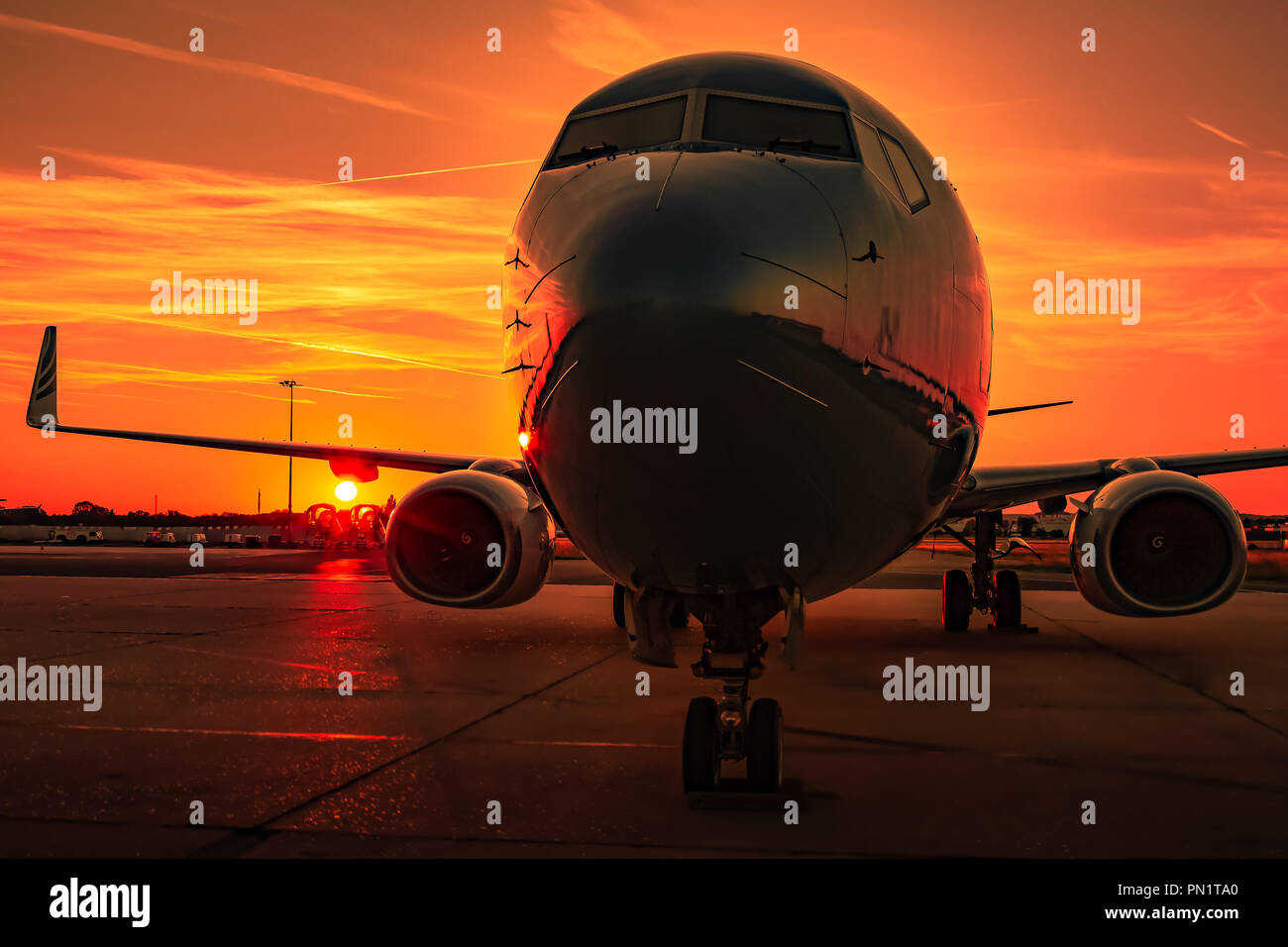 Executive airplane flying at sunset hires stock photography and images