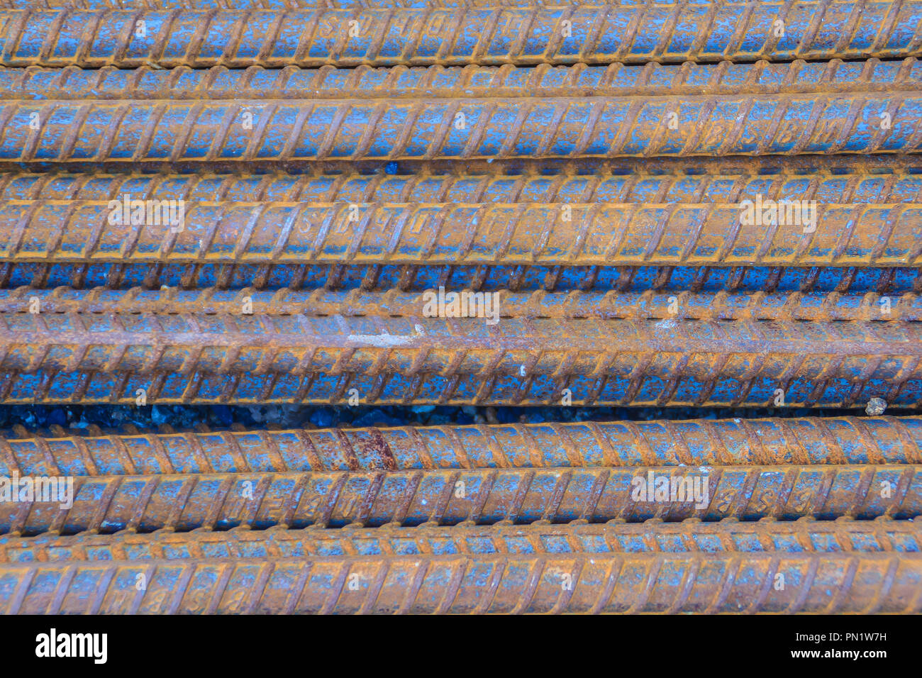 Rusty deformed bars for reinforcement concrete background. Rusty Rebar