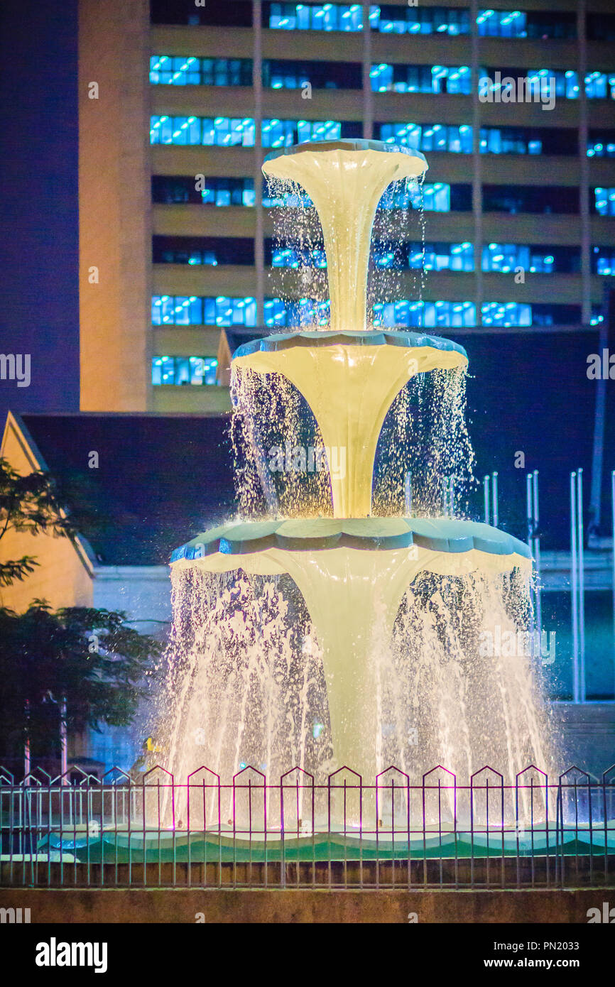 High pressure metal nozzles on fountain spraying jets of water into the