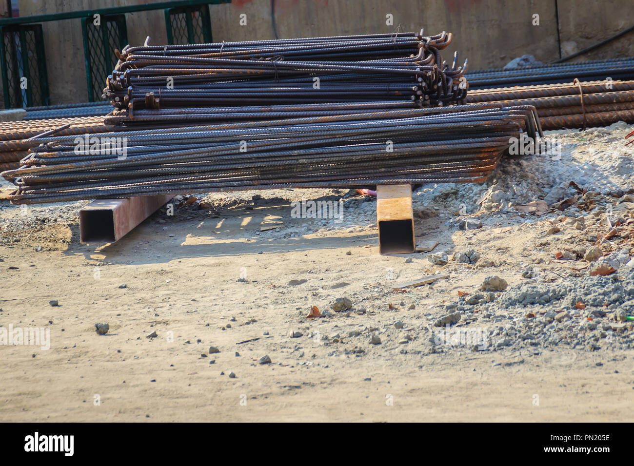 Bent deformed steel bars ready for reinforced concrete work. Cut and