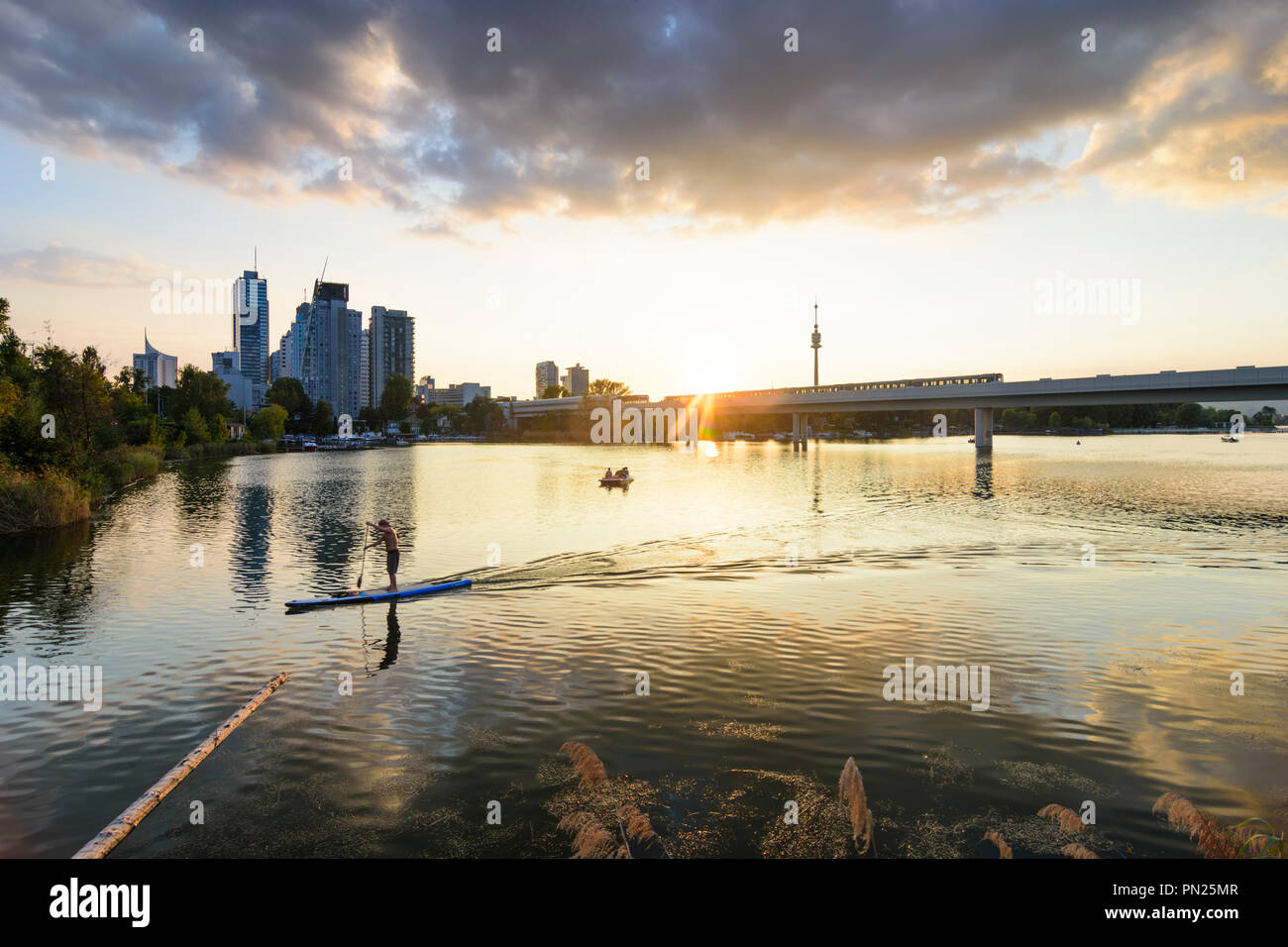 Wien, Vienna sunset at lake Alte Donau (Old Danube), skyscraper of