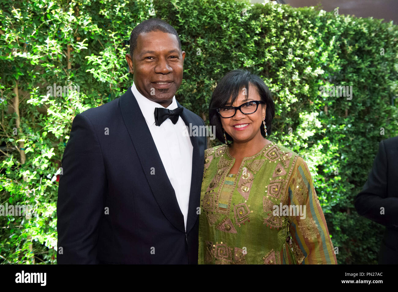 Dennis Haysbert (left) and Academy President Cheryl Boone Isaacs attend the 6th Annual Governors Awards in The Ray Dolby Ballroom at Hollywood & Highland Center® in Hollywood, CA, on Saturday, November 8, 2014.  File Reference # 32487 141THA  For Editorial Use Only -  All Rights Reserved Stock Photo