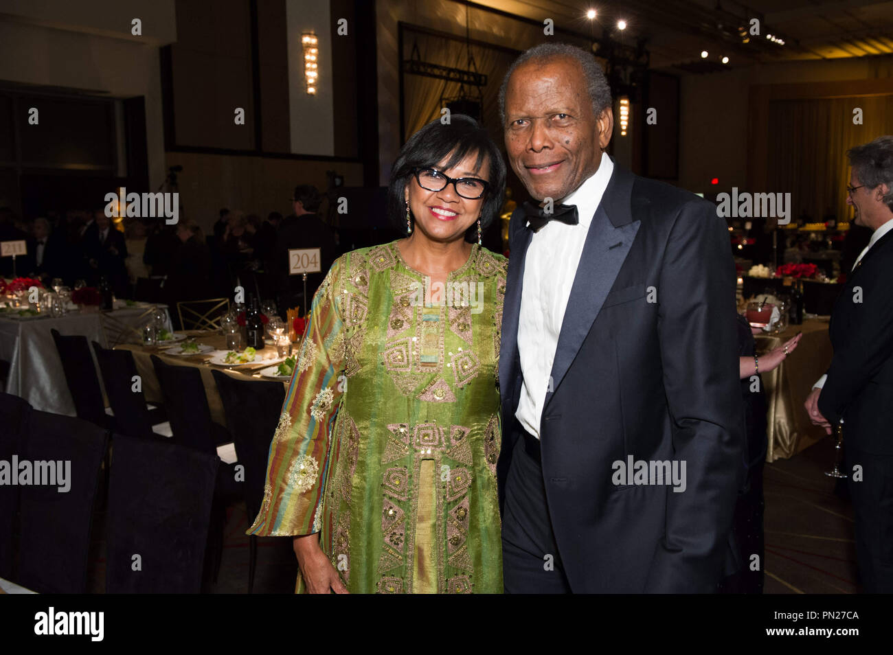 Academy President Cheryl Boone Isaacs (left) and Sidney Poitier attend the 6th Annual Governors Awards in The Ray Dolby Ballroom at Hollywood & Highland Center® in Hollywood, CA, on Saturday, November 8, 2014.  File Reference # 32487 167THA  For Editorial Use Only -  All Rights Reserved Stock Photo