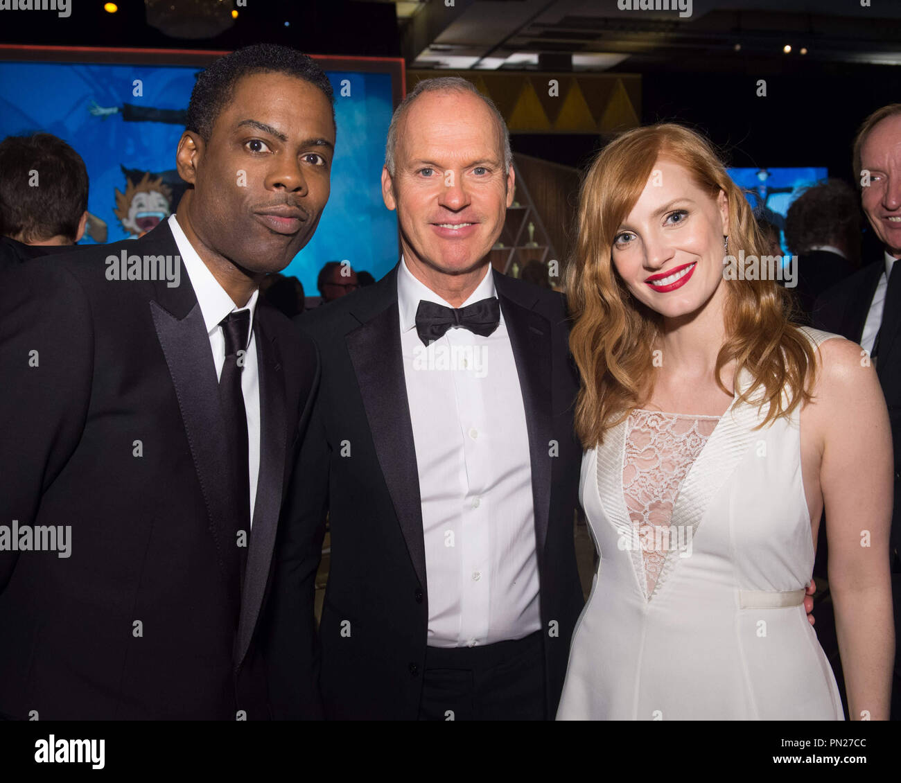 Chris Rock (left), Michael Keaton (center) and Jessica Chastain attend the 6th Annual Governors Awards in The Ray Dolby Ballroom at Hollywood & Highland Center® in Hollywood, CA, on Saturday, November 8, 2014.  File Reference # 32487 168THA  For Editorial Use Only -  All Rights Reserved Stock Photo