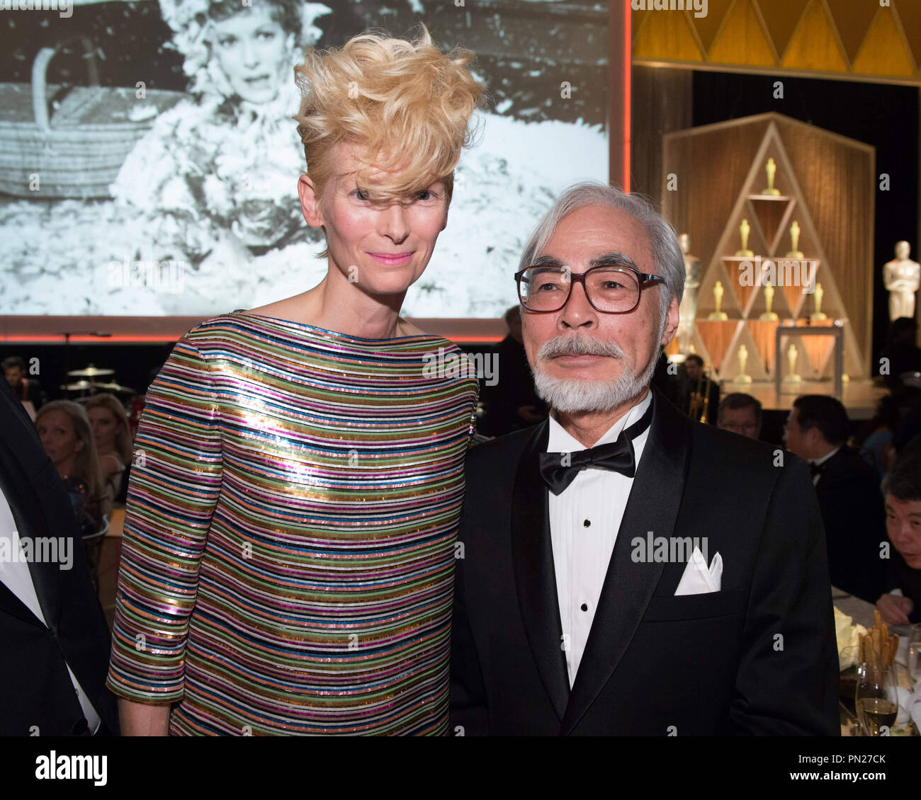 Tilda Switon (left) and Honorary Award recipient Hayao Miyazaki attend the 6th Annual Governors Awards in The Ray Dolby Ballroom at Hollywood & Highland Center® in Hollywood, CA, on Saturday, November 8, 2014.  File Reference # 32487 170THA  For Editorial Use Only -  All Rights Reserved Stock Photo