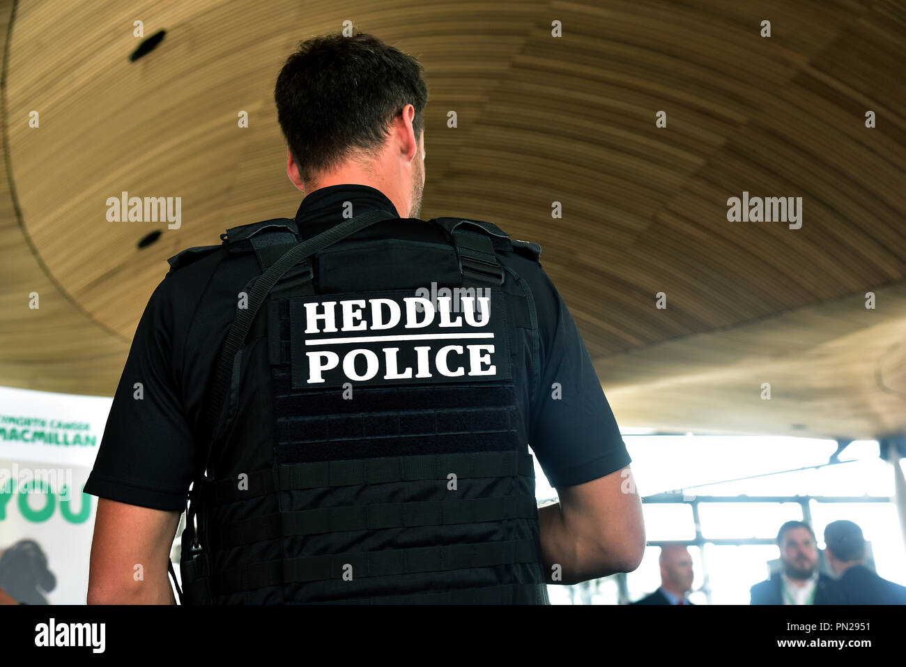Armed police. South Wales police officers, Heddlu/Police are pictured