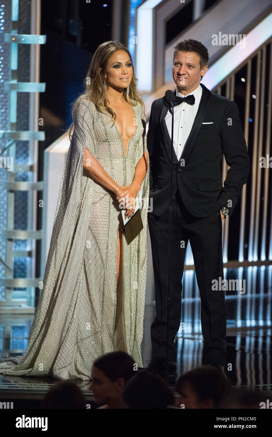 Jennifer Lopez and Jeremy Renner present the award for Best Mini-Series or TV Movie at the 72nd Annual Golden Globe Awards at the Beverly Hilton in Beverly Hills, CA on Sunday, January 11, 2015.   File Reference # 32536 696JRC  For Editorial Use Only -  All Rights Reserved Stock Photo