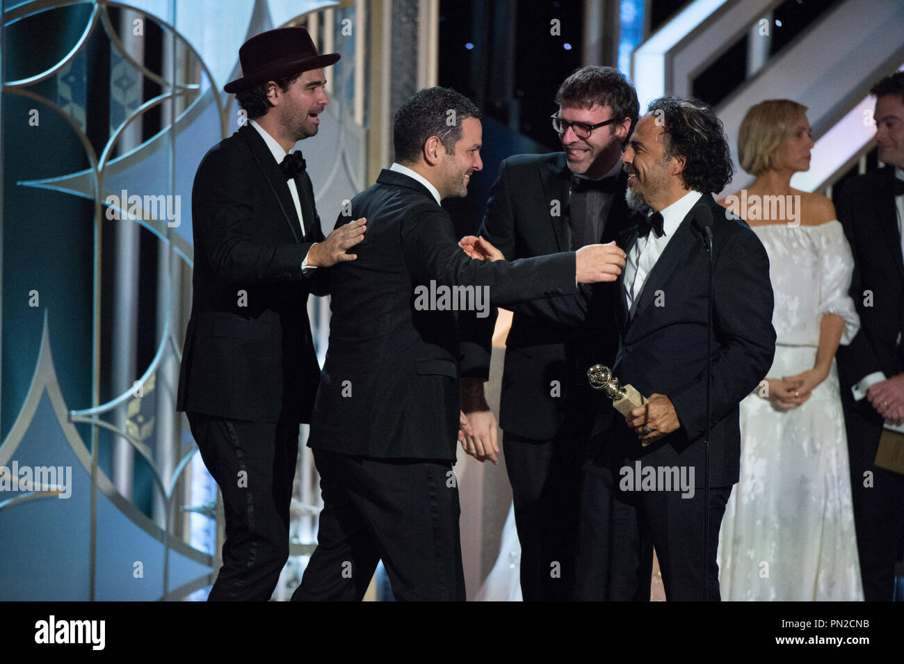 The Golden Globe is awarded to Alejandro González Iñárritu, Nicolás Giacobone, Alexander Dinelaris and Armando Bo for BEST SCREENPLAY – MOTION PICTURE for “BIRDMAN” at the 72nd Annual Golden Globe Awards at the Beverly Hotel in Beverly Hills, CA on Sunday, January 11, 2015.  File Reference # 32536 732JRC  For Editorial Use Only -  All Rights Reserved Stock Photo