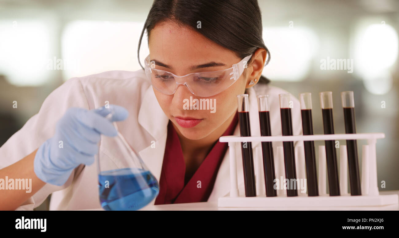 Hispanic female gloves lab hi-res stock photography and images - Alamy