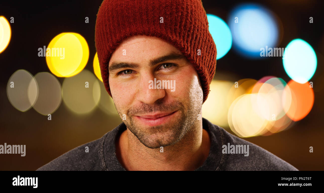 Attractive white guy wearing beanie  smiling at camera Stock Photo