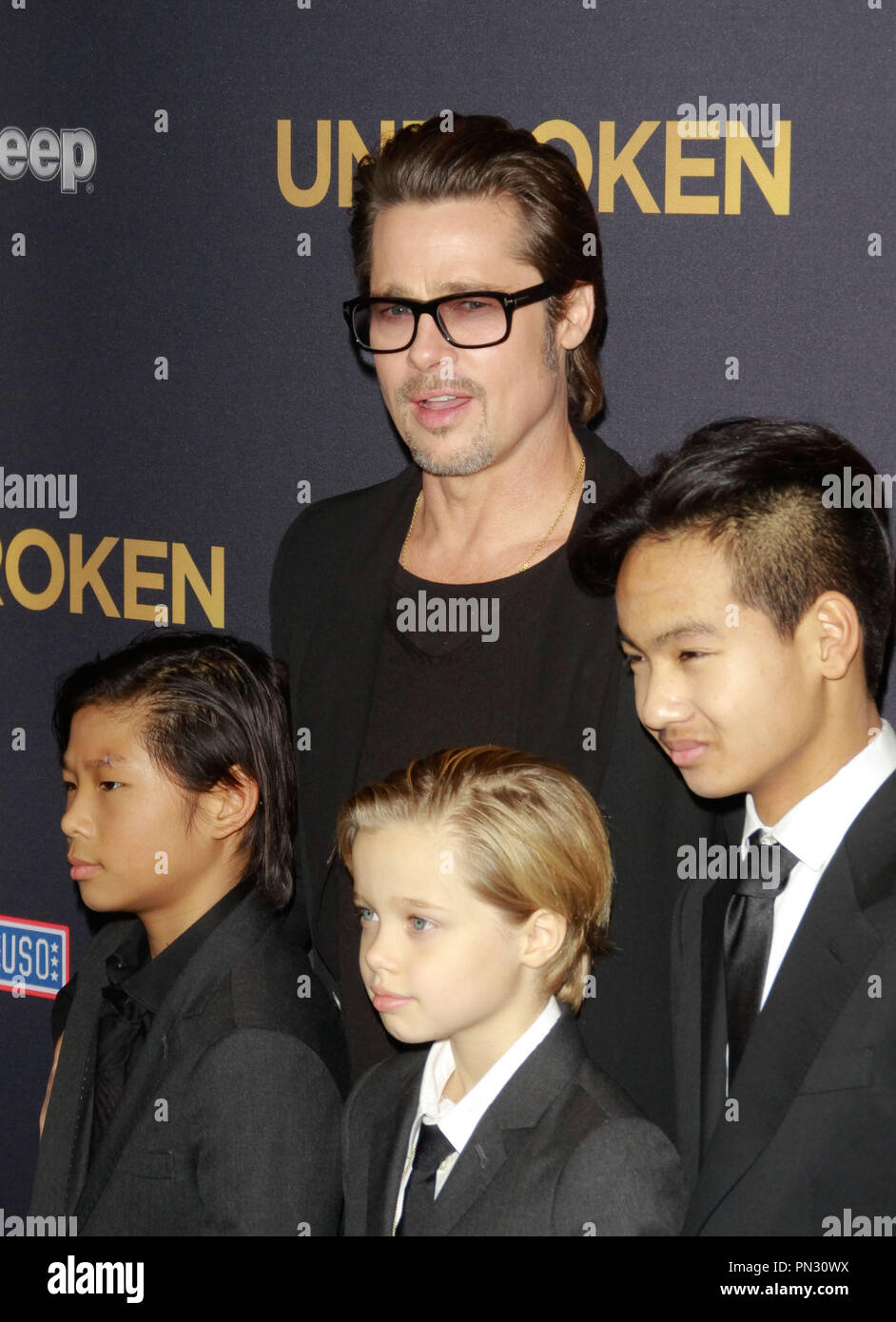Pax Jolie-Pitt, Brad Pitt, Shiloh Jolie-Pitt and Maddox Jolie-Pi at the Universal Pictures' premiere of 'Unbroken' held at Dolby Theatre in Hollywood, CA, December15, 2014. Photo by Joe Martinez / PictureLux Stock Photo