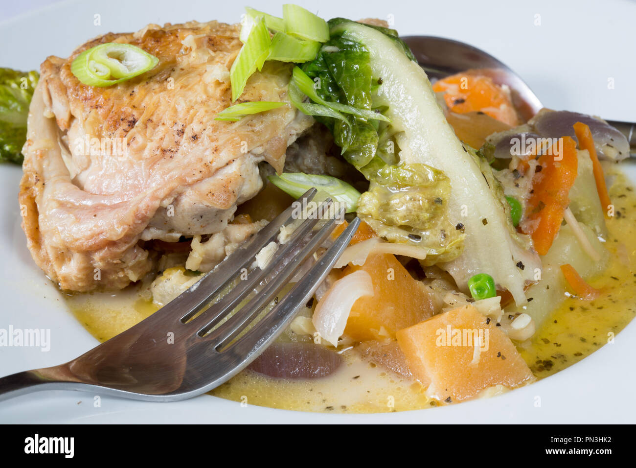 Braised Chicken and vegetable casserole. Stock Photo