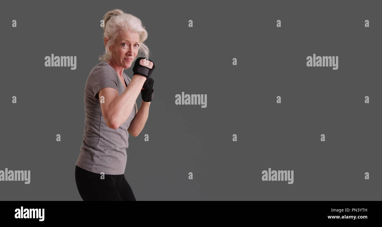 Mature caucasian woman martial arts hires stock photography and images