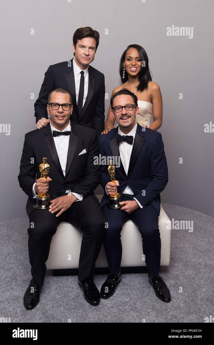Presenters Jason Bateman And Kerry Washington Pose Backstage With James Lucas And Mat Kirkby And Their Oscar For Best Live Action Short Film For Work On The Phone Call During The Live