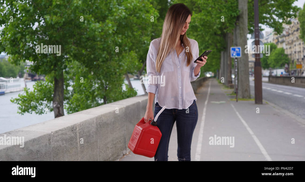 Find Nearest Gas Station >> Woman With Plastic Jerrycan Using Phone To Find Nearest Gas Station Find Nearest Gas Station >> Woman With Plastic Jerrycan Using Phone To Find Nearest Gas Station