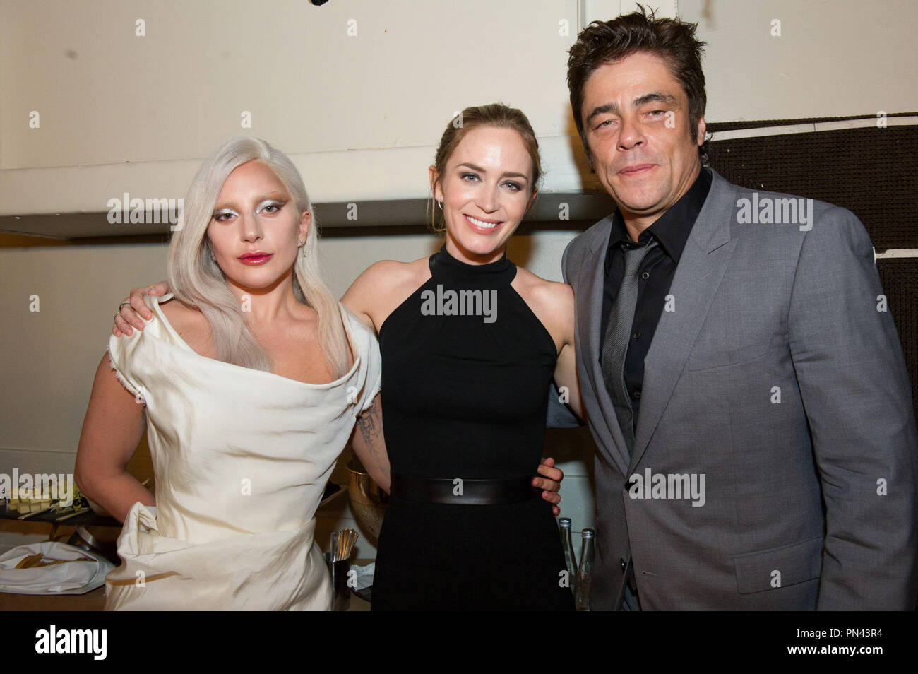 Beverly Hills, CA. August 13, 2015 Hollywood Foreign Press Association presents annual Grants Dinner Thursday night from the Beverly Wilshire Hotel.  The HFPA will present more than $2 million in donations to non-profit entertainment-related organizations and scholarship programs.  Pictured: Lady Gaga accepts for the Music Center / Young Musicians Foundation with Emily Blunt and John Krasinsky.  File Reference # 32703 004JRC  For Editorial Use Only -  All Rights Reserved Stock Photo