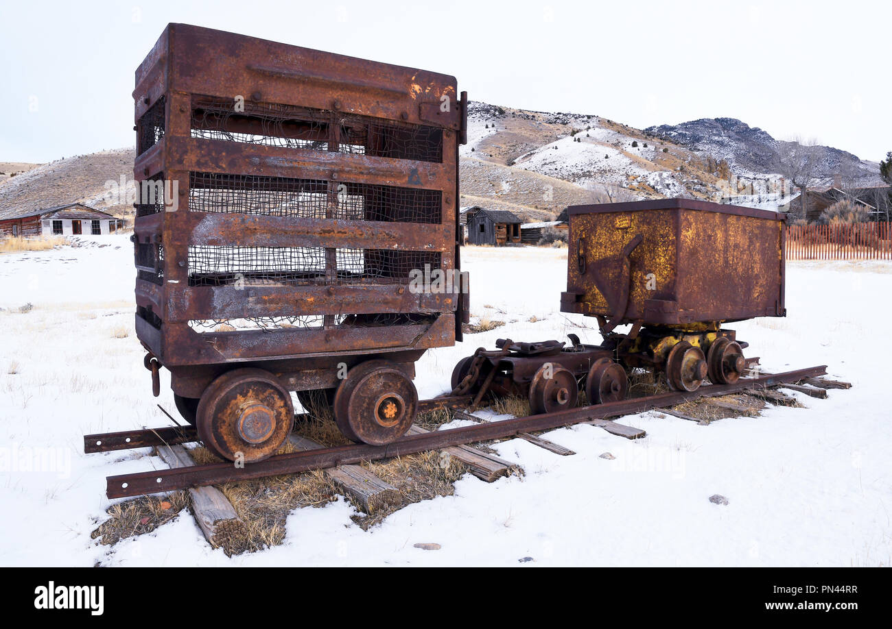 BANNACK, MONTANA, USA -  December 15, 2017: Rusty gold mining cars at Bannack Historic State Park Stock Photo