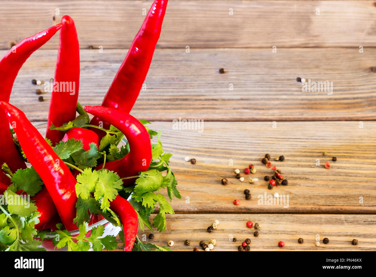 Red chili peper on wooden background Close up Stock Photo