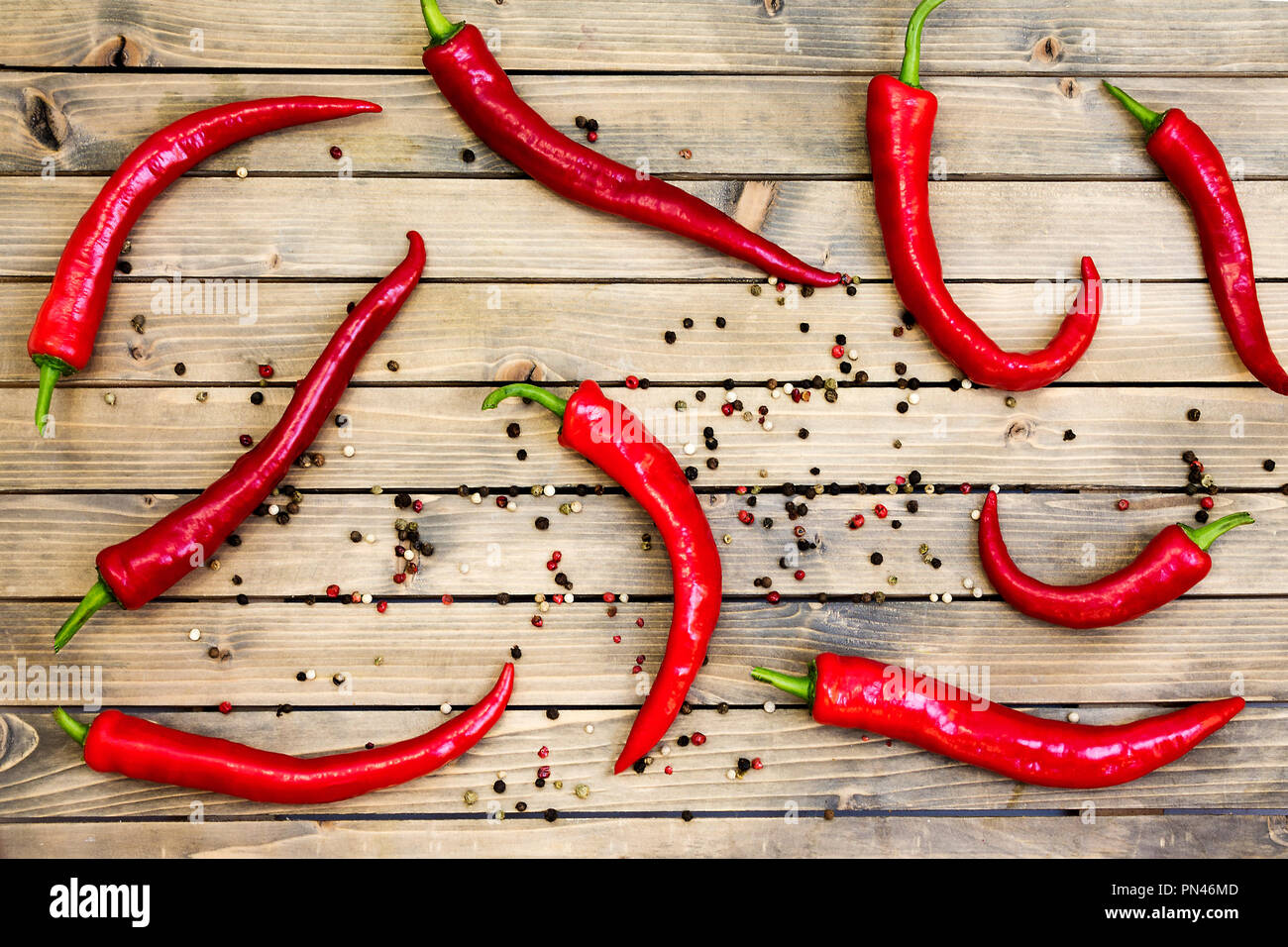 Red chili peper on wooden background Close up Stock Photo
