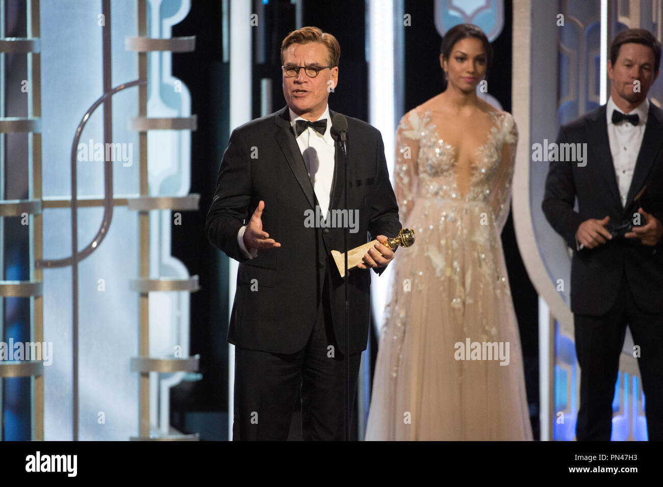 The Golden Globe is awarded to Aaron Sorkin for BEST SCREENPLAY – MOTION PICTURE for 'Steve Jobs' at the 73rd Annual Golden Globe Awards at the Beverly Hotel in Beverly Hills, CA on Sunday, January 10, 2016. Stock Photo