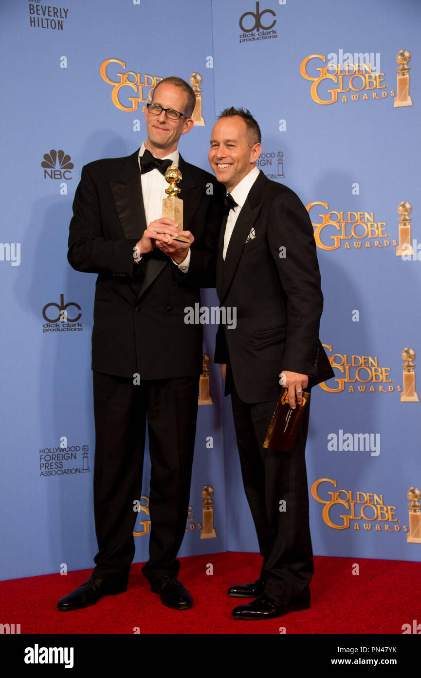 For BEST ANIMATED FEATURE FILM, the Golden Globe is awarded to 'Inside Out,' directed by Pete Docter and Ronnie Del Carmen. Pete Docter and Jonas Rivera pose with the award backstage in the press room at the 73rd Annual Golden Globe Awards at the Beverly Hilton in Beverly Hills, CA on Sunday, January 10, 2016. Stock Photo