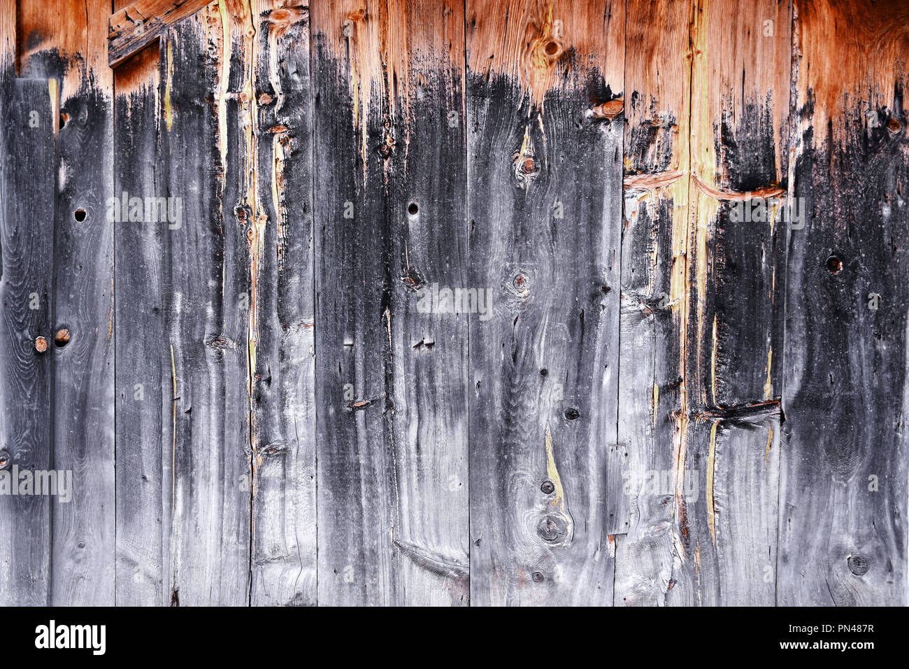 Two-toned wooden wall with black and brown colors Stock Photo