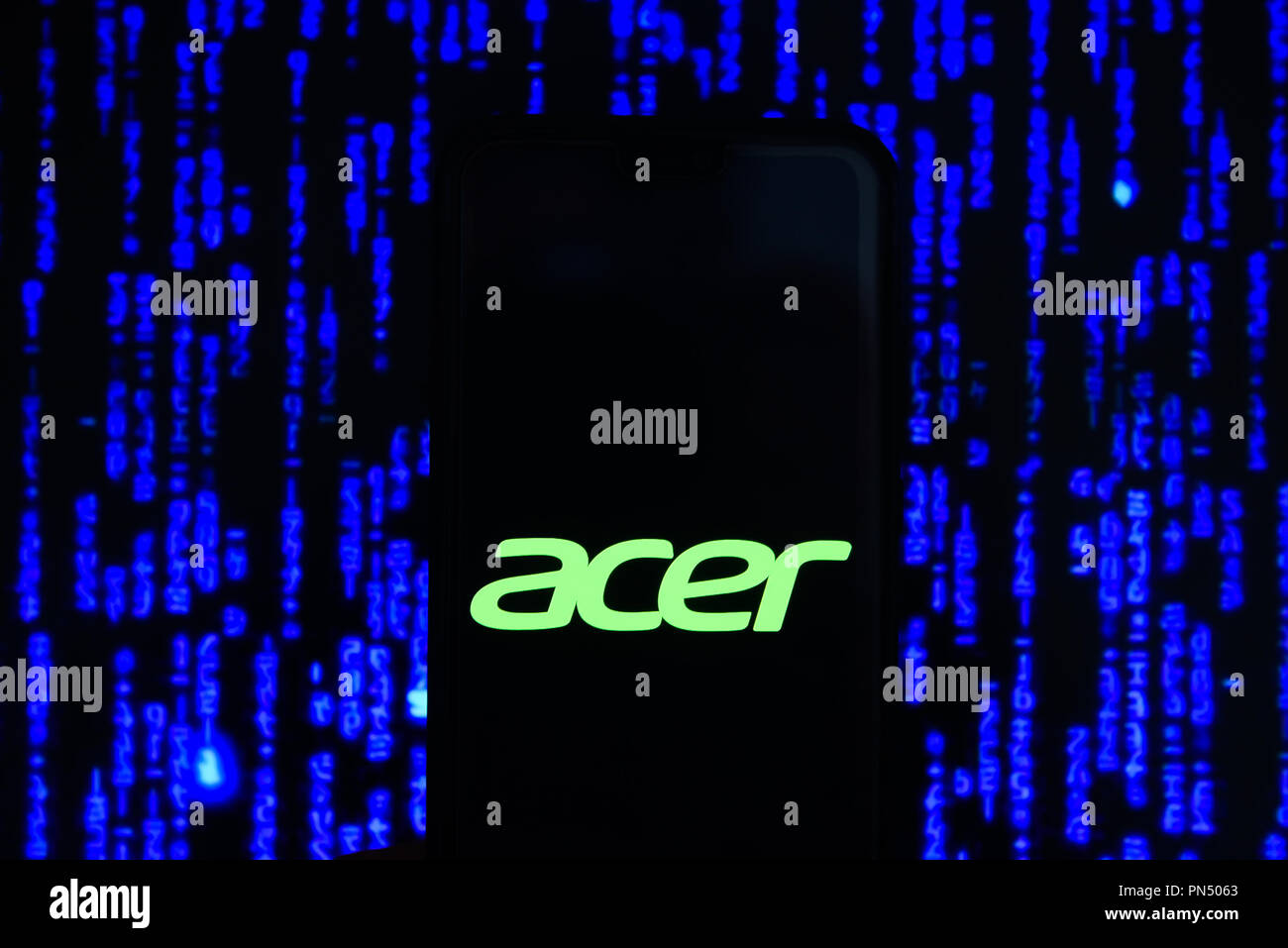 Acer logo is seen on an android mobile phone. Stock Photo