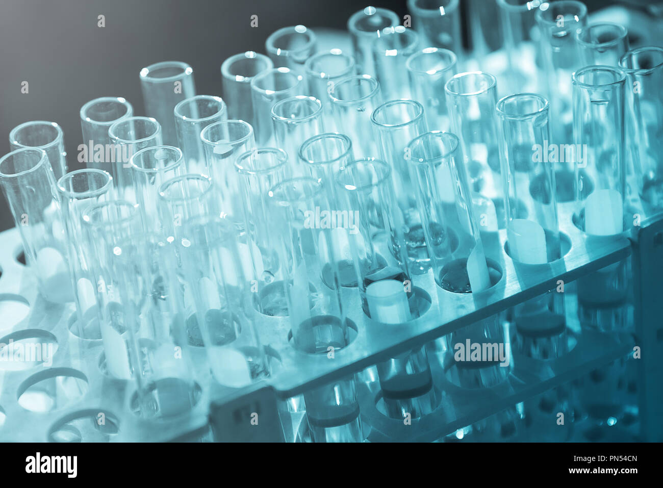Scientist adding solution test tube hi-res stock photography and images ...