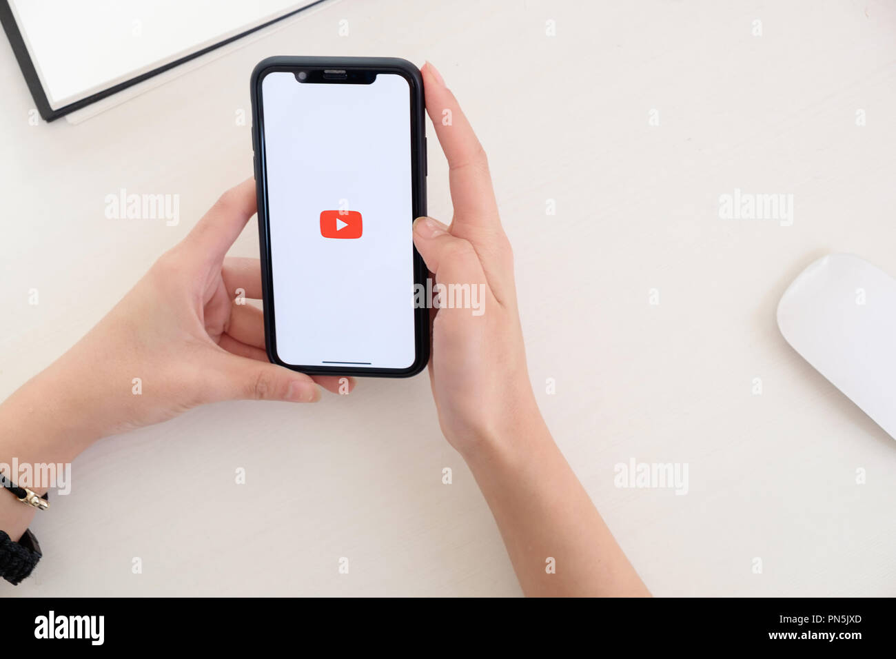 Chiangmai Thailand 15 Mar 18 A Woman Showing Screen Shot Of Youtube On New Iphone X Youtube App On The Screen Lying On Old Wood Desk Youtube Is Stock Photo Alamy