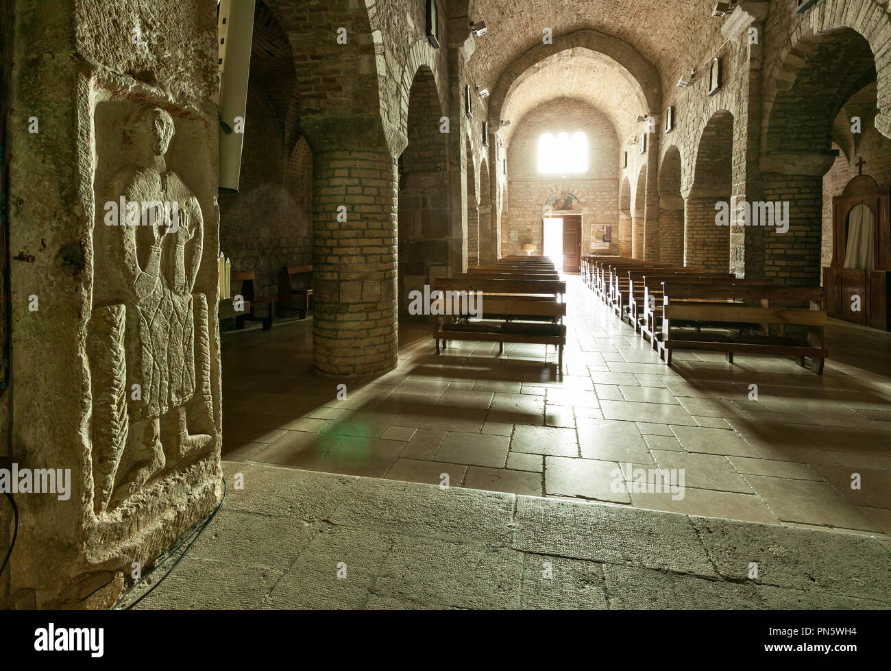 strange medieval character sculpted in the church of S. Maria delle Grazie. Abruzzo Stock Photo