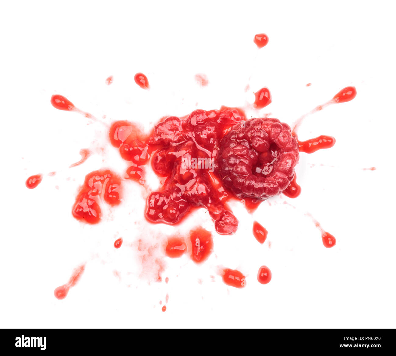 Smashed raspberries isolated on white Stock Photo