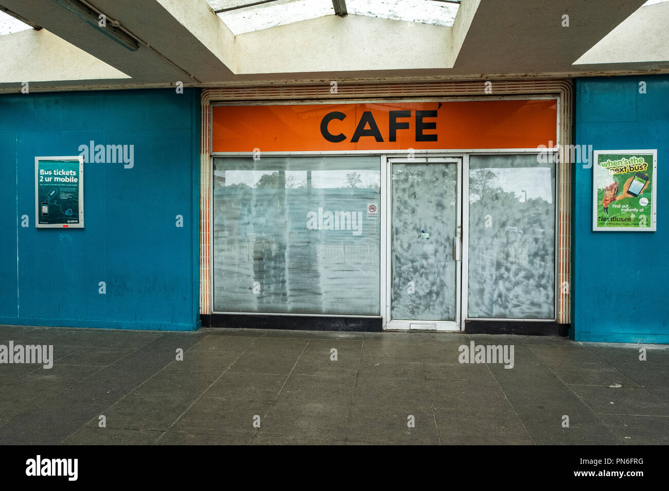 Closed down and white washed cafe at bus station in Crewe Cheshire UK Stock Photo